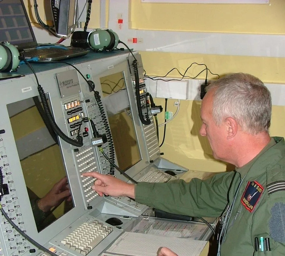 Solider at a control station